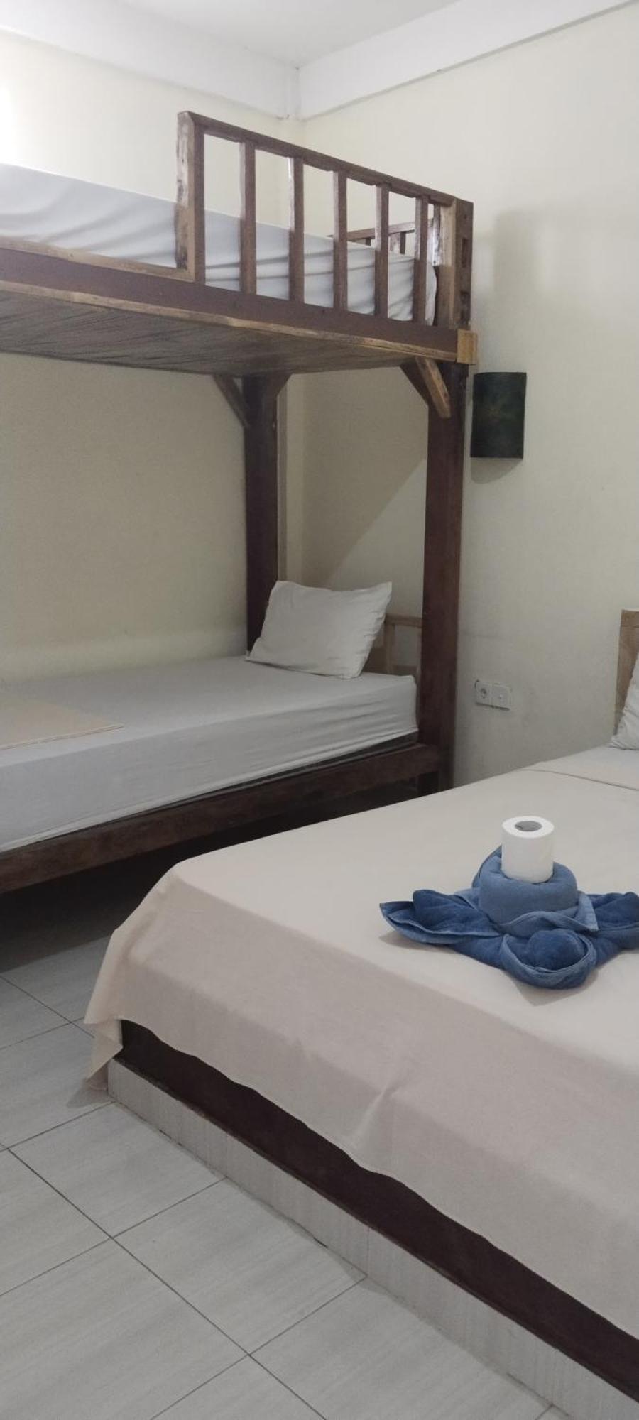 Amed Stop Inn Homestay, Rooftop Restaurant And Bar Экстерьер фото