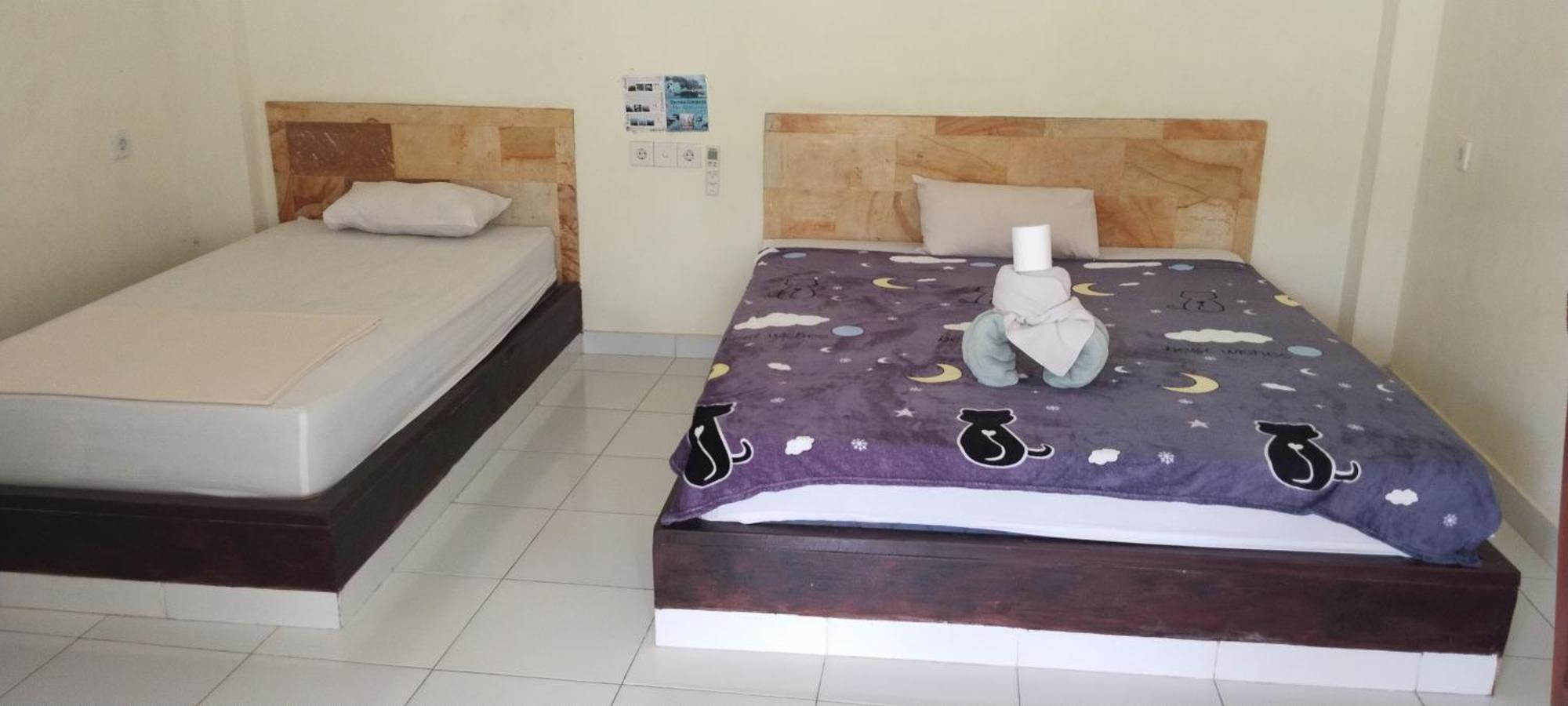 Amed Stop Inn Homestay, Rooftop Restaurant And Bar Экстерьер фото