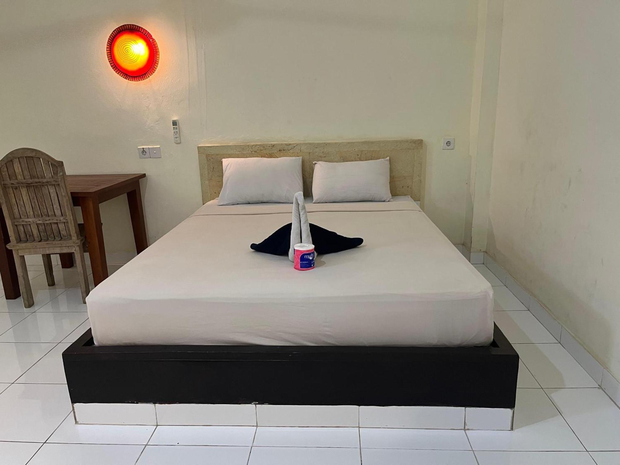 Amed Stop Inn Homestay, Rooftop Restaurant And Bar Экстерьер фото
