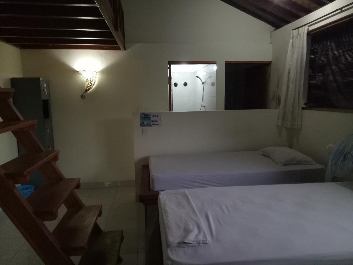 Amed Stop Inn Homestay, Rooftop Restaurant And Bar Экстерьер фото