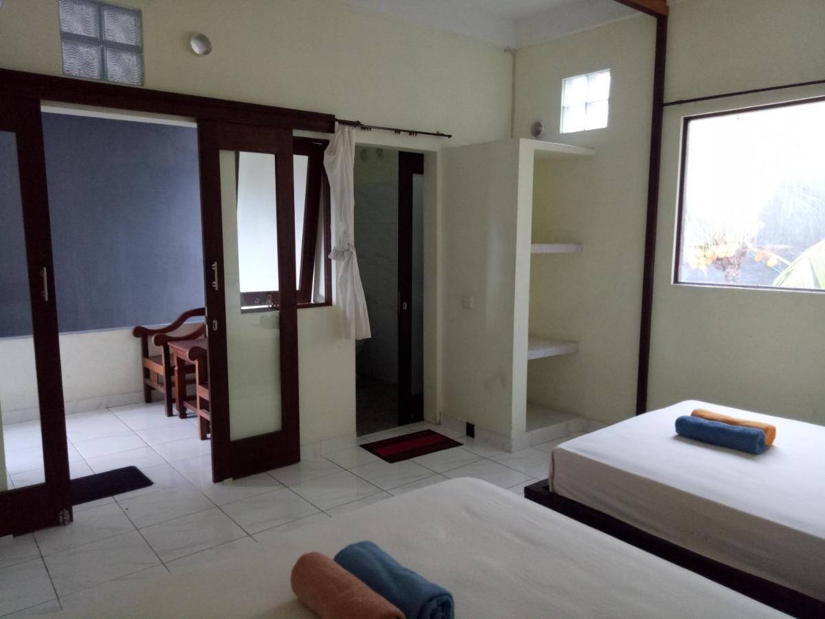 Amed Stop Inn Homestay, Rooftop Restaurant And Bar Экстерьер фото