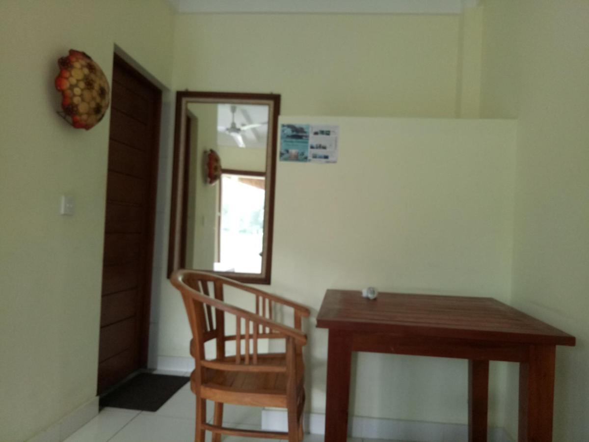 Amed Stop Inn Homestay, Rooftop Restaurant And Bar Экстерьер фото