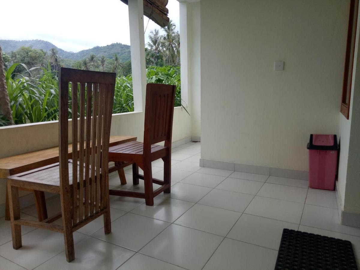 Amed Stop Inn Homestay, Rooftop Restaurant And Bar Экстерьер фото