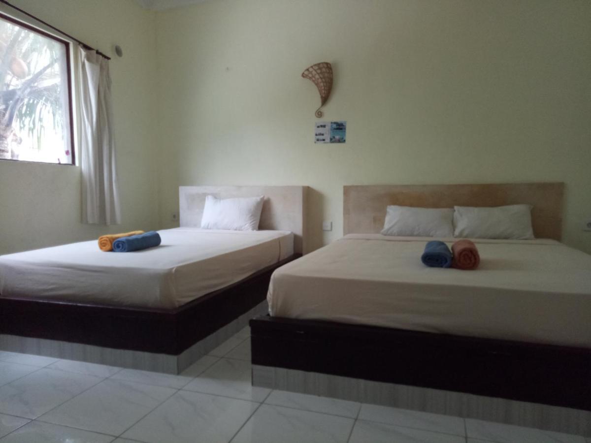 Amed Stop Inn Homestay, Rooftop Restaurant And Bar Экстерьер фото